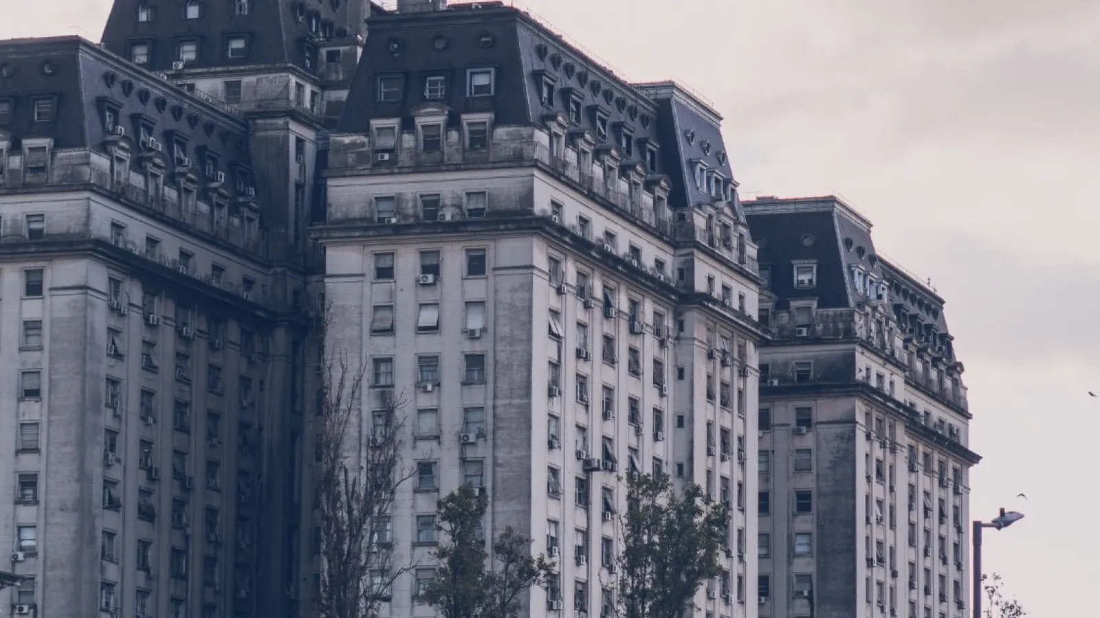 The Edificio Libertador in Retiro, Buenos Aires, under an overcast sky.